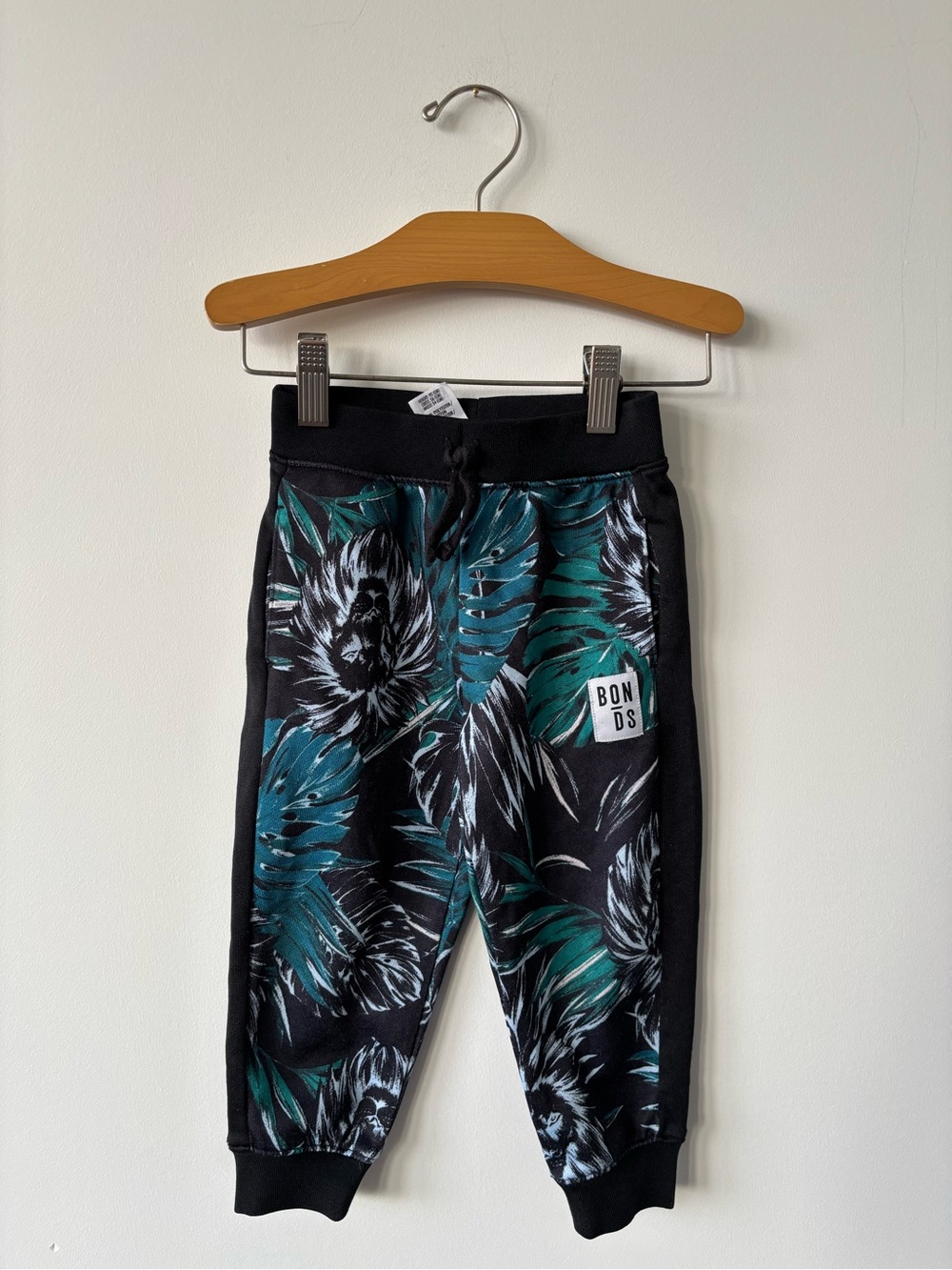 Bonds Black Joggers with Teal & Green Tropical Print